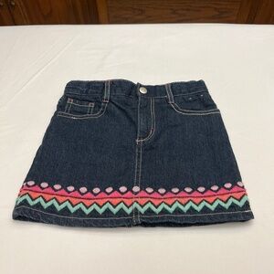 Brand New, Never Worn, Girls Denim Skort.  Embroidered Trim Around Bottom.Sz. 5.